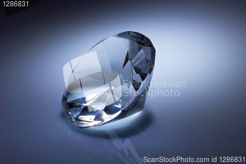 Image of Diamond jewel on dark blue