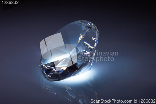 Image of Diamond jewel on dark blue