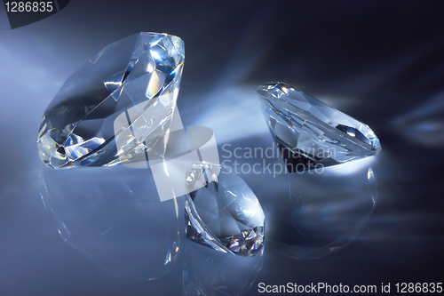 Image of Shiny diamonds jewel on dark blue