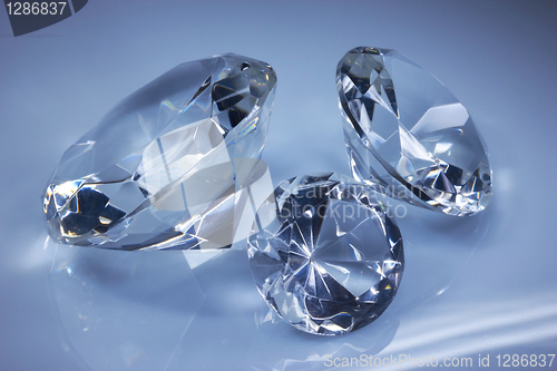 Image of Shiny diamonds jewel on dark blue