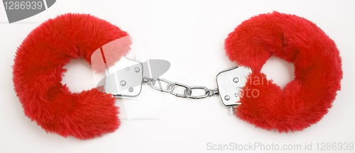 Image of fluffy pink handcuffs