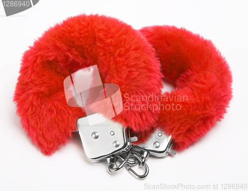 Image of fluffy pink handcuffs