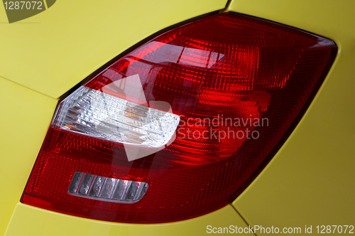 Image of lanterns of the yellow modern car