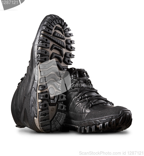 Image of Man's winter leather boots of black color, isolated on white