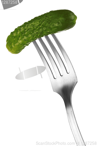 Image of pickled cucumber on a fork