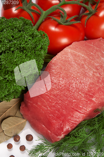 Image of Raw fresh meat with tomato