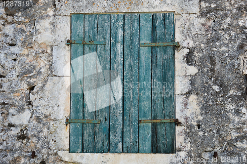 Image of blue window shutter