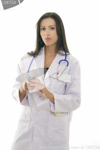 Image of Doctor or Nurse using mobile phone.