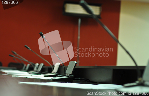 Image of Conference table, microphones close-up