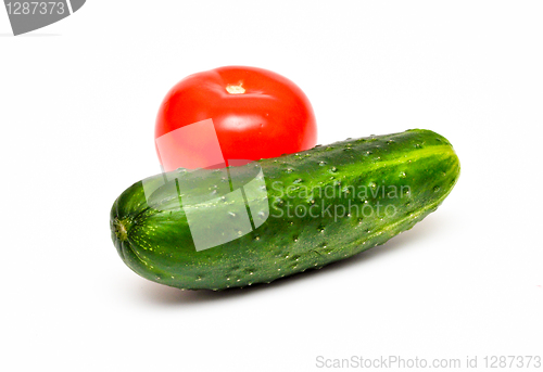 Image of cucumber and tomato isolated on white