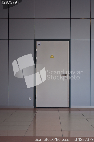 Image of door to utility room in a modern office building