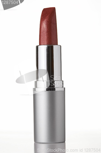 Image of red lipstick on white background