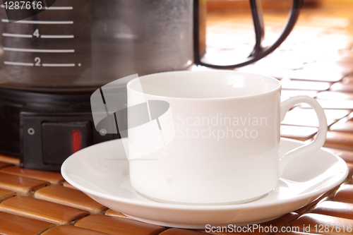 Image of coffee machine and cup 