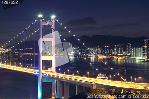 Image of traffic highway bridge at night