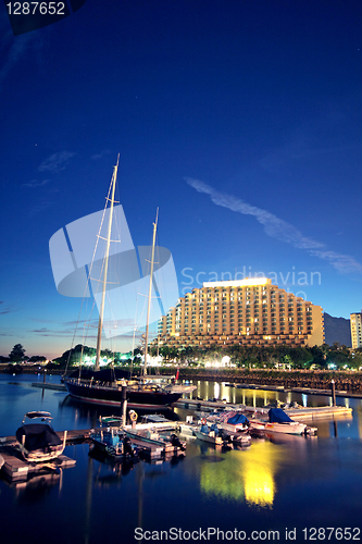 Image of large yachts in the golden coast at night 