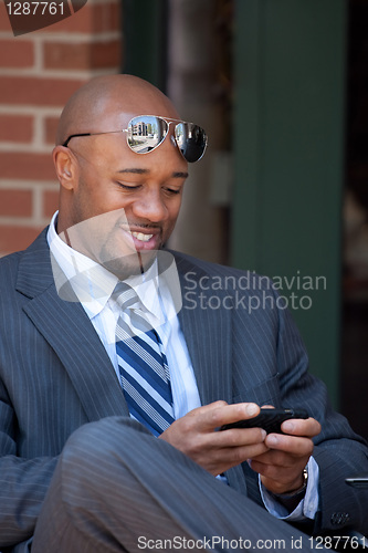 Image of Modern Business Man Texting