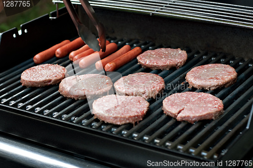 Image of Hot Dogs and Hamburgers on the Grill