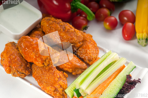 Image of  buffalo chicken wings served with pinzimonio