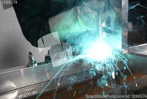 Image of Welder with sparks