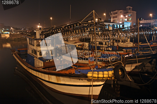 Image of Fishing boats at night