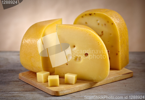 Image of cheese on wooden cutting board