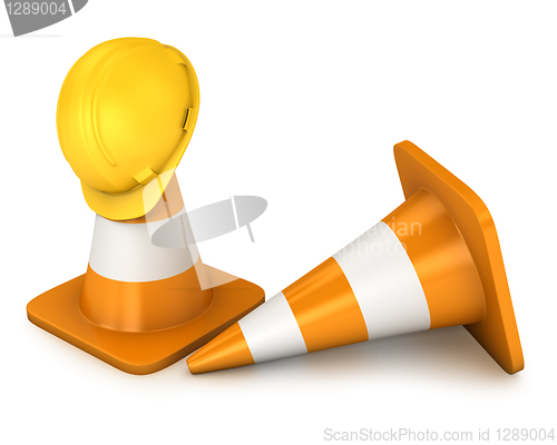 Image of Two roadcones and yellow helmet