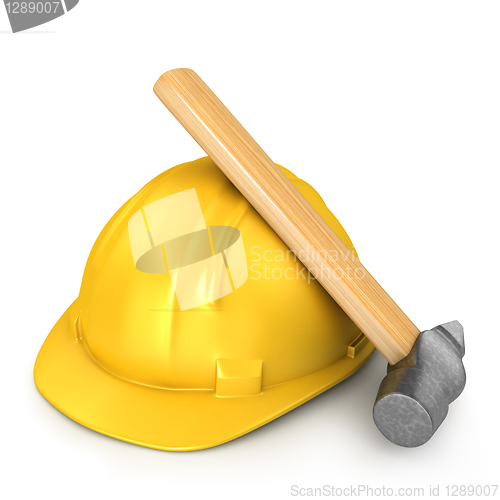Image of New yellow helmet with hammer