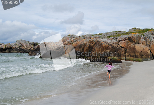 Image of running on beach