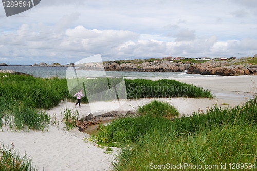 Image of beach on cloudy day