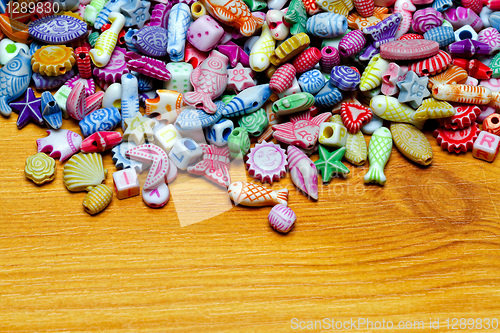 Image of Beads at wood