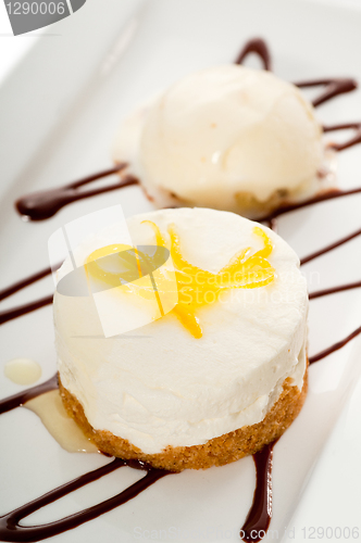 Image of  lemon mousse served whith lemon peel on top