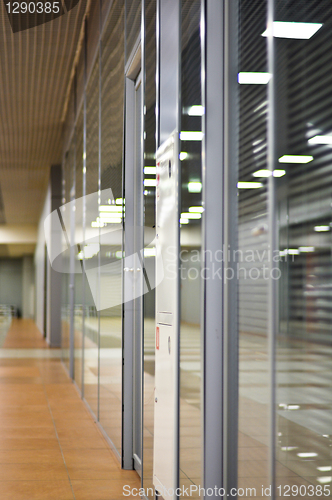 Image of Wall with glass partitions and doors in office building
