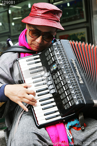 Image of Street musician busking