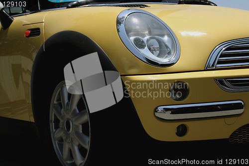 Image of Yellow car close up