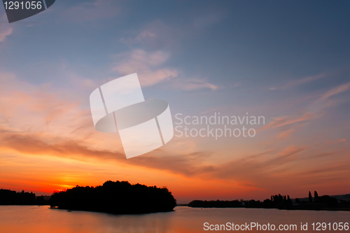 Image of Multicolour cloudscape over reservoir