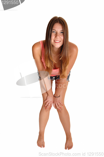 Image of Girl bending forward.