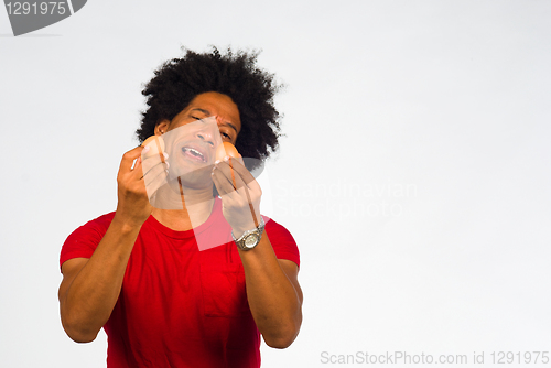 Image of Macho gesturing