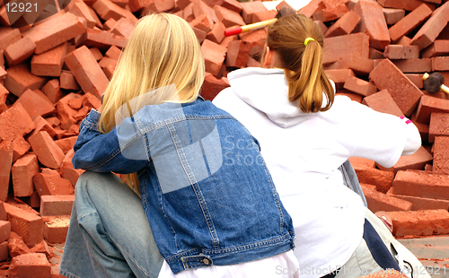 Image of Teen girls Vs.bricks