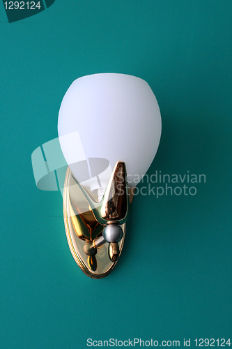 Image of Wall Lamp Against Green Background
