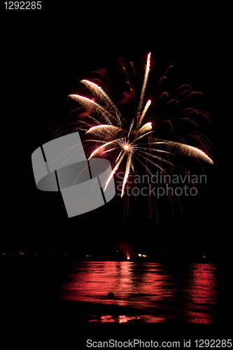 Image of Fireworks Over Water with Reflections