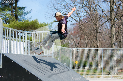 Image of Skateboarder On a Skate Ramp