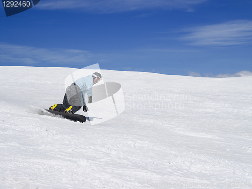 Image of Snowboarder against beautiful sky