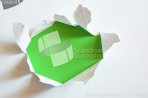 Image of green hole in blank sheet paper