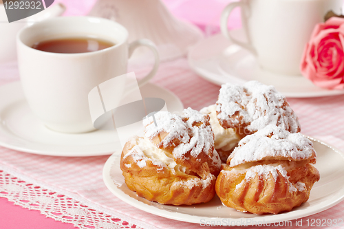 Image of eclairs and tea