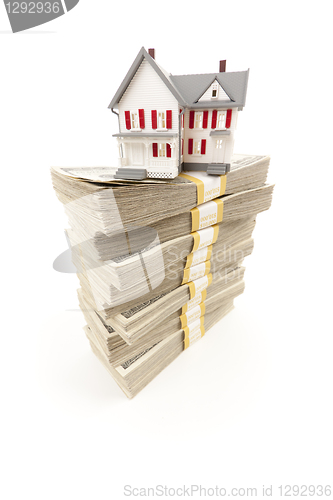 Image of Small House on Stacks of Hundred Dollar Bills