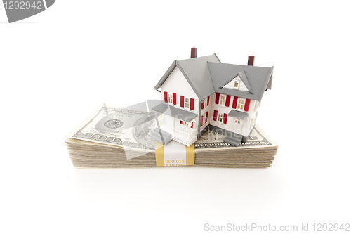 Image of Small House on Stack of Hundred Dollar Bills