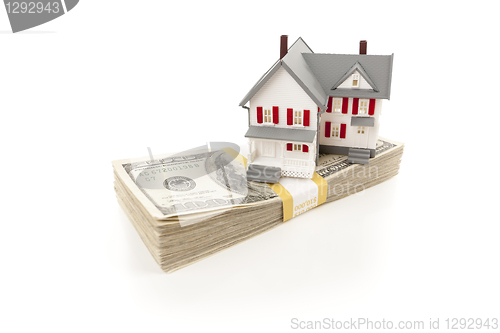 Image of Small House on Stack of Hundred Dollar Bills