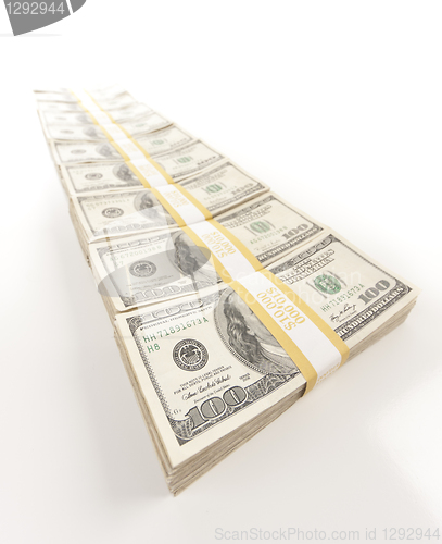 Image of Fading Row of Hundred Dollar Bills Stacks