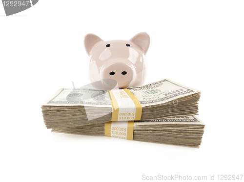 Image of Pink Piggy Bank with Stacks of Money