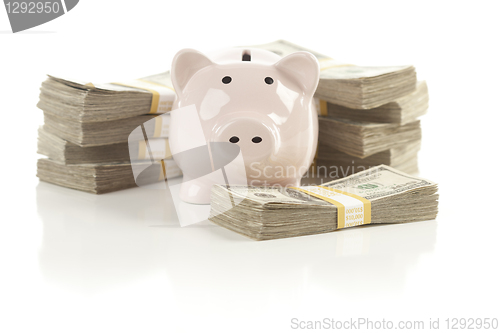 Image of Pink Piggy Bank with Stacks of Money